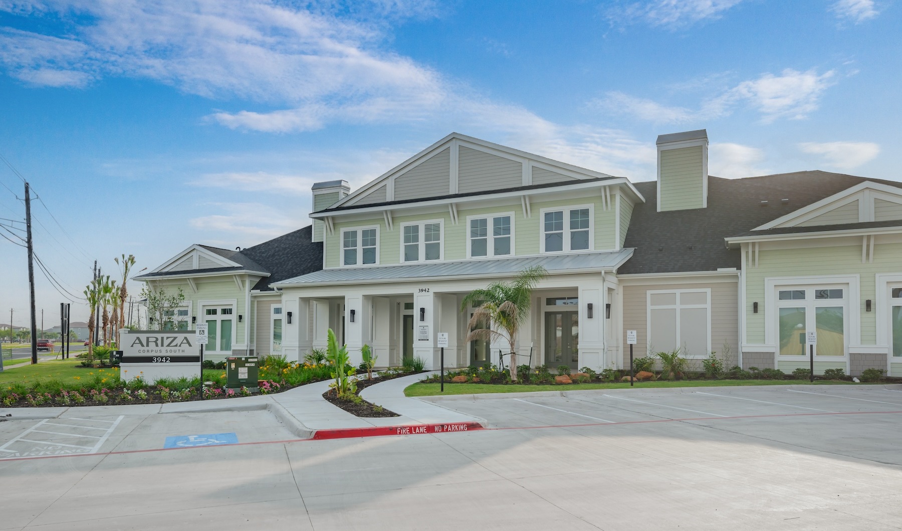 Live Better at ARIZA view of front of building with landscaping