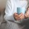 a person holding a cup