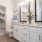 bright bathroom with walk-in closet