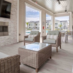 Covered Patio furnished covered patio with wide screen tv and electric fireplace
