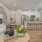 bright livingn room open to dining and kitchen areas