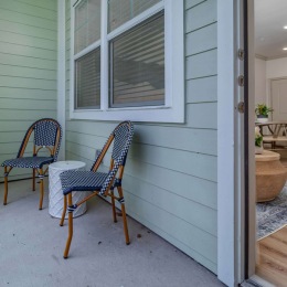 patio with a small table and chairs